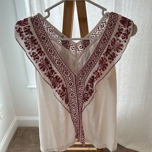 Cute Tank top with red embroidery.